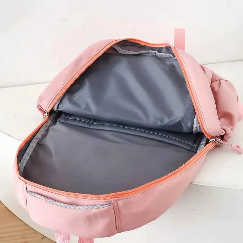 Комплект от 4 части - раница и чанти за училище "Lovely Rattit"